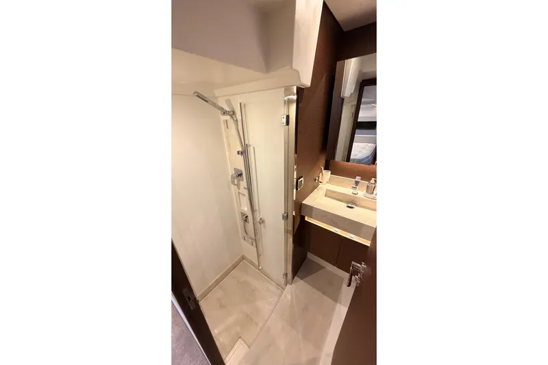  Yacht Photos Pics Luxurious bathroom in 2020 Prestige 520 yacht with modern shower and sleek vanity.