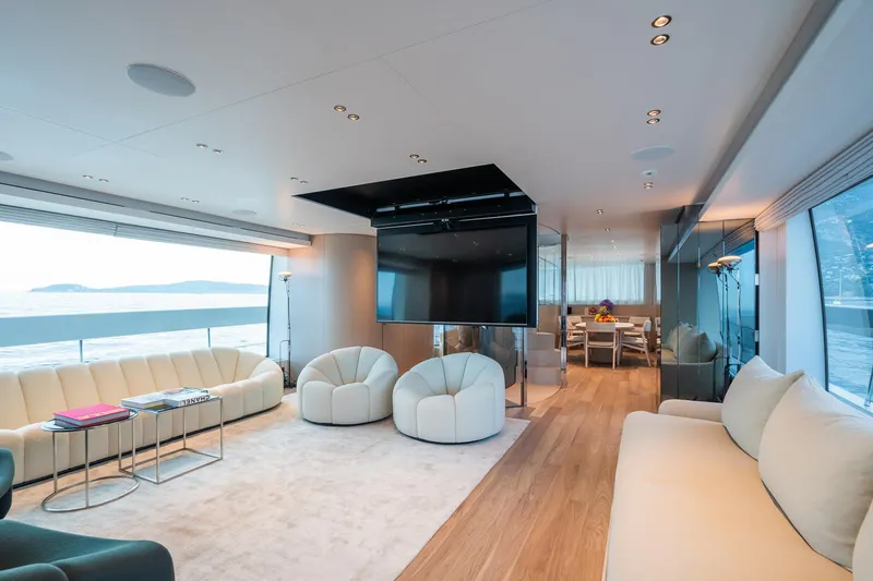 Ami Yacht Photos Pics Luxurious interior of 2023 Sanlorenzo SX112 yacht with modern seating and ocean view.