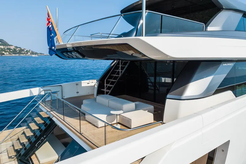 Ami Yacht Photos Pics 2023 Sanlorenzo SX112 yacht with modern design, spacious deck, and ocean backdrop.