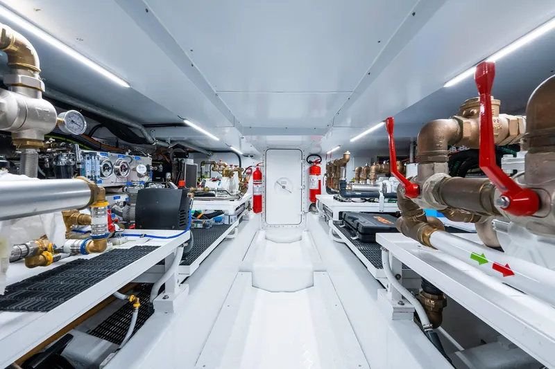 Ami Yacht Photos Pics Engine room of 2023 Sanlorenzo SX112 yacht, featuring advanced mechanical systems and piping.