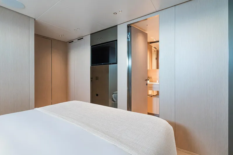 Ami Yacht Photos Pics Luxurious Sanlorenzo SX112 2023 yacht interior with modern bedroom and ensuite bathroom.