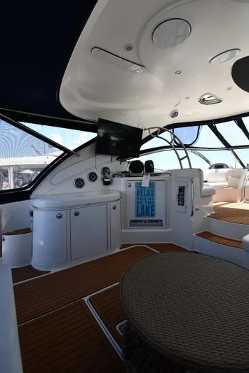 This Is It Yacht Photos Pics Interior of 2005 Cruisers Yachts 520 Express with modern helm and seating area.