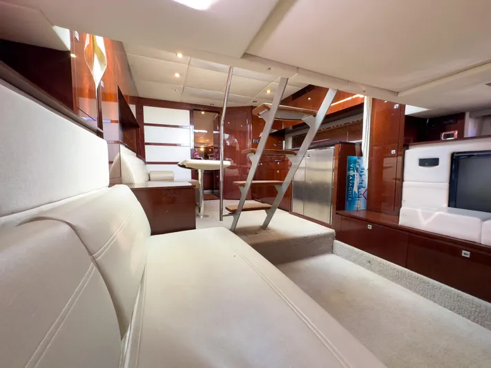  Yacht Photos Pics Luxurious interior of 2010 Sea Ray 450 Sundancer yacht with modern furnishings.