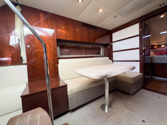  Yacht Photos Pics Interior of 2010 Sea Ray 450 Sundancer yacht with modern seating and dining area.