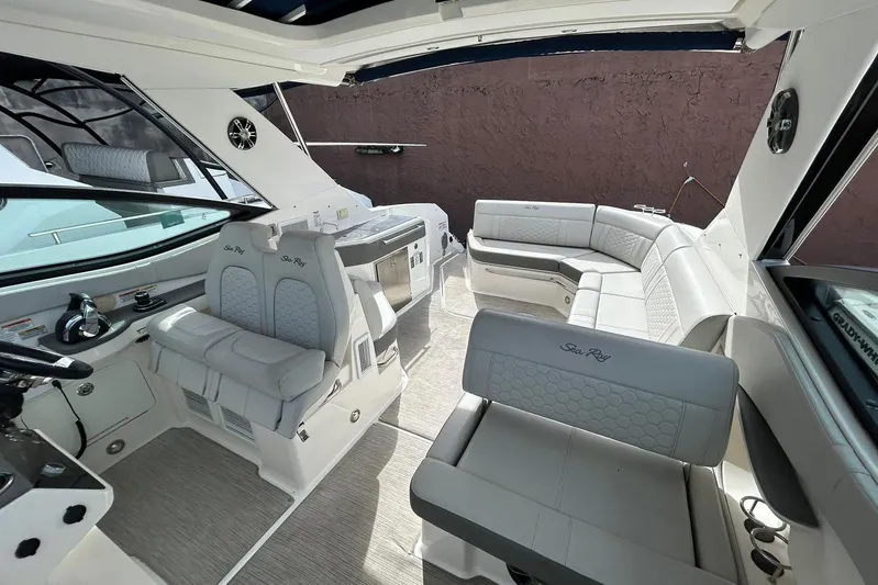  Yacht Photos Pics 2020 Sea Ray Sundancer 320 interior with luxurious seating and modern design.