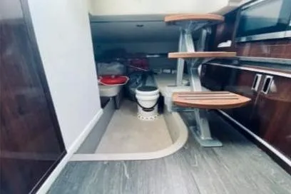  Yacht Photos Pics 2020 Sea Ray Sundancer 320 interior with modern stairs and compact toilet area.