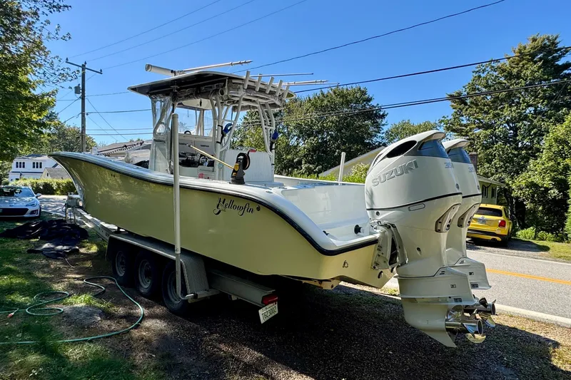  Yacht Photos Pics 2007 Yellowfin 34 Offshore boat with dual Suzuki engines on a trailer.