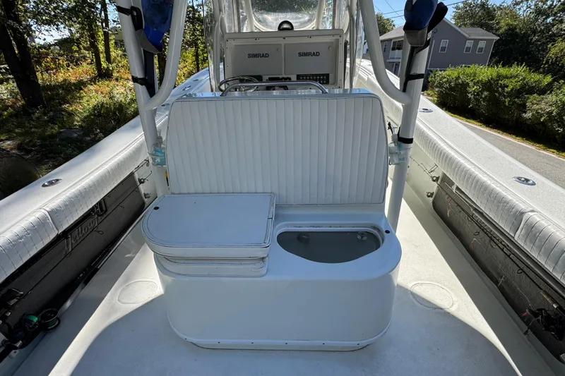  Yacht Photos Pics 2007 Yellowfin 34 Offshore boat interior with seating and Simrad electronics.