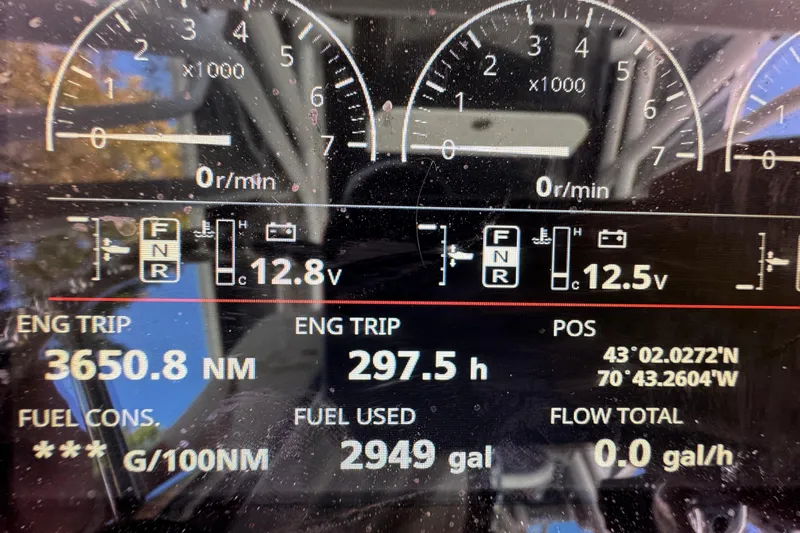  Yacht Photos Pics Dashboard of a 2007 Yellowfin 34 Offshore showing engine trip data and fuel usage.