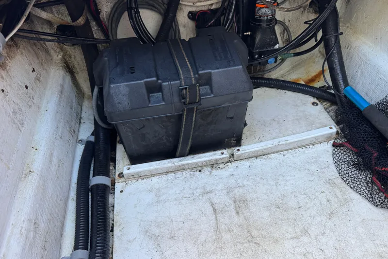  Yacht Photos Pics 2007 Yellowfin 34 Offshore boat interior with battery box and wiring.