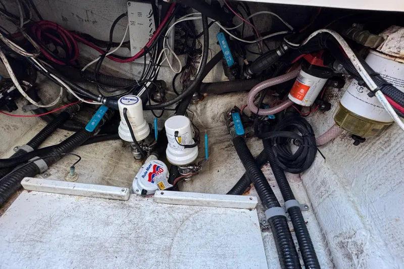  Yacht Photos Pics 2007 Yellowfin 34 Offshore boat wiring and pump system in the engine compartment.