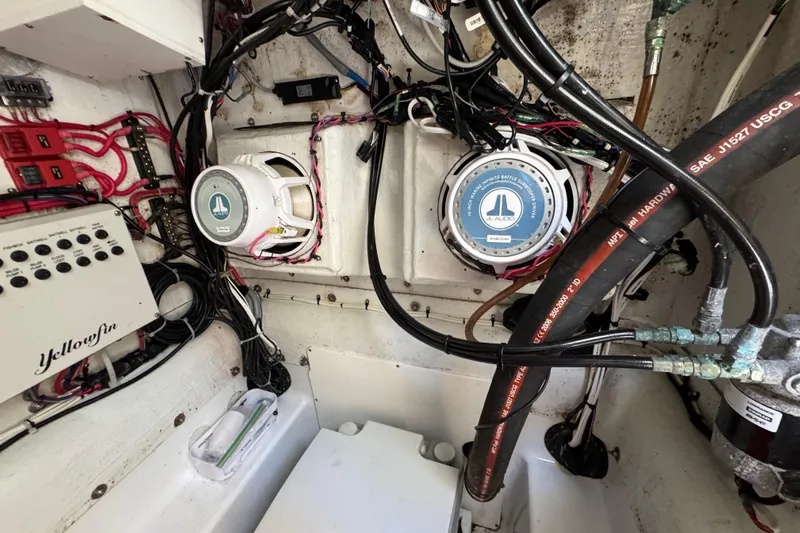  Yacht Photos Pics Interior of a 2007 Yellowfin 34 Offshore boat showing wiring and audio system components.