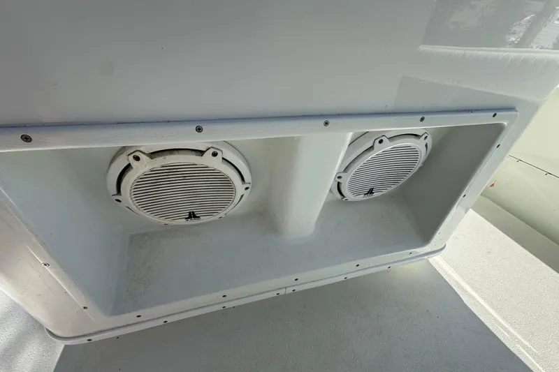  Yacht Photos Pics 2007 Yellowfin 34 Offshore boat speakers in a white compartment.