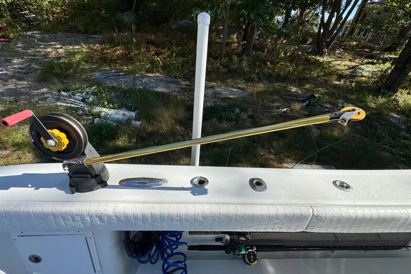  Yacht Photos Pics 2007 Yellowfin 34 Offshore boat with fishing rod holder and reel setup.