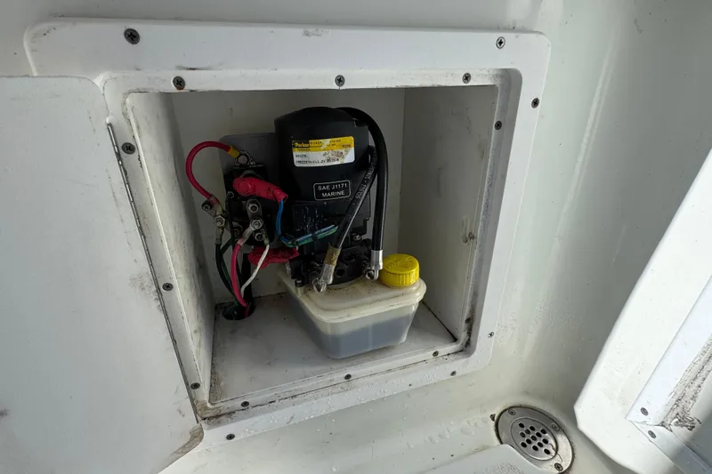  Yacht Photos Pics 2007 Yellowfin 34 Offshore boat compartment with marine equipment and wiring.