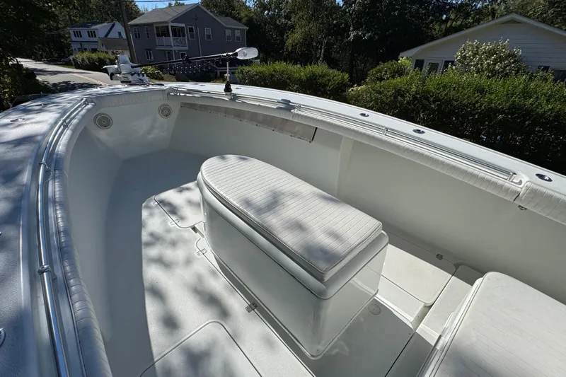  Yacht Photos Pics 2007 Yellowfin 34 Offshore boat interior with seating and fishing rod holders.