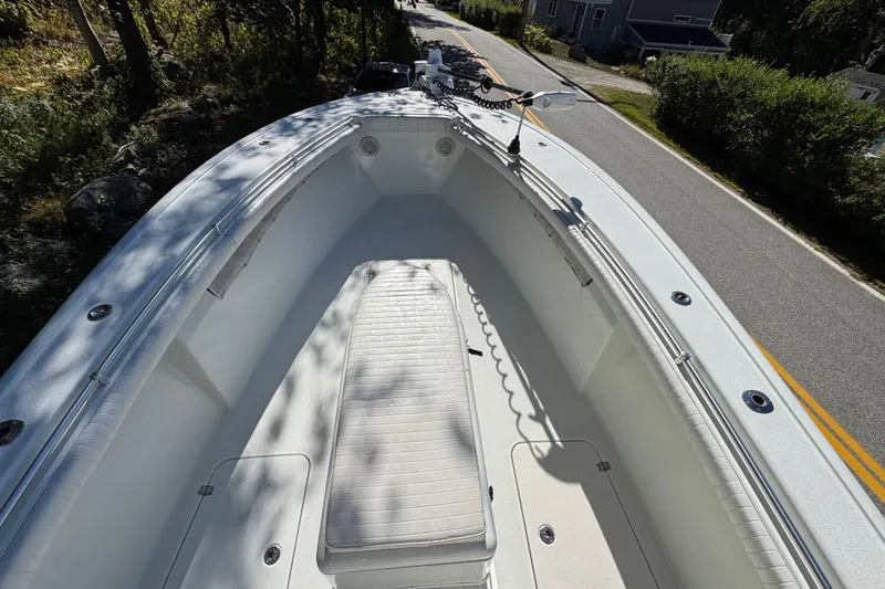  Yacht Photos Pics 2007 Yellowfin 34 Offshore boat, spacious deck view, parked on a road.