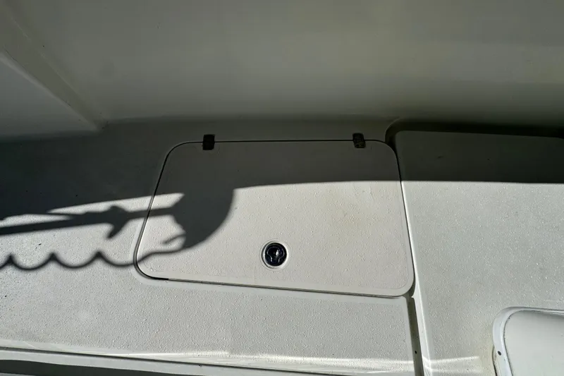  Yacht Photos Pics 2007 Yellowfin 34 Offshore boat deck with storage compartment.