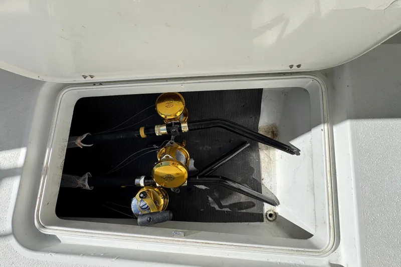  Yacht Photos Pics Fishing rods stored in a compartment on a 2007 Yellowfin 34 Offshore boat.