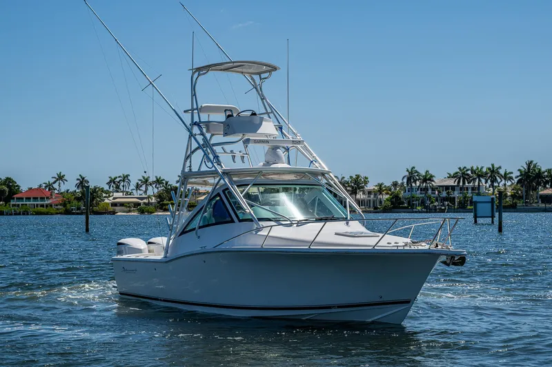 Seaclusion Yacht Photos Pics 2018 Albemarle 290 Express Fisherman boat on calm water, clear sky background.