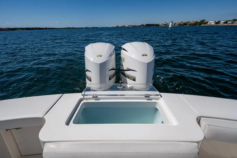 Seaclusion Yacht Photos Pics 2018 Albemarle 290 Express Fisherman boat with twin engines on a calm sea.