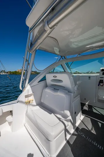 Seaclusion Yacht Photos Pics 2018 Albemarle 290 Express Fisherman boat interior with seating, under clear blue sky.
