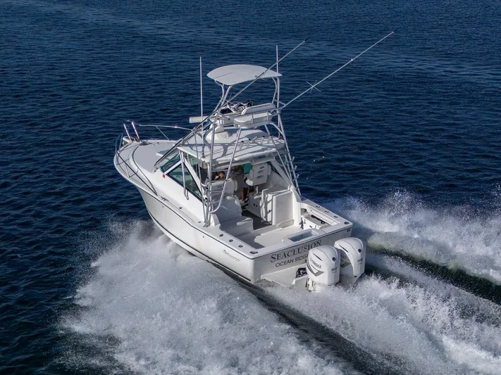 Seaclusion Yacht Photos Pics 2018 Albemarle 290 Express Fisherman boat cruising on open water.