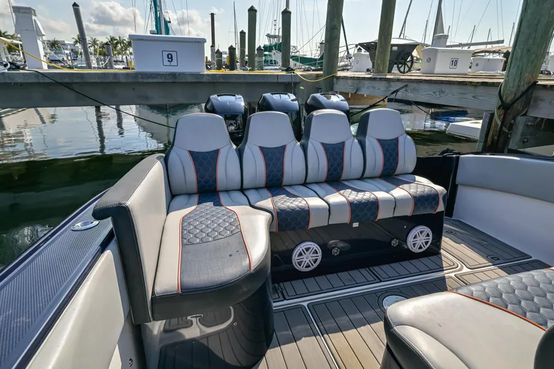 Opal Yacht Photos Pics Luxurious seating on a 2014 Midnight Express 37’ Open boat docked at a marina.