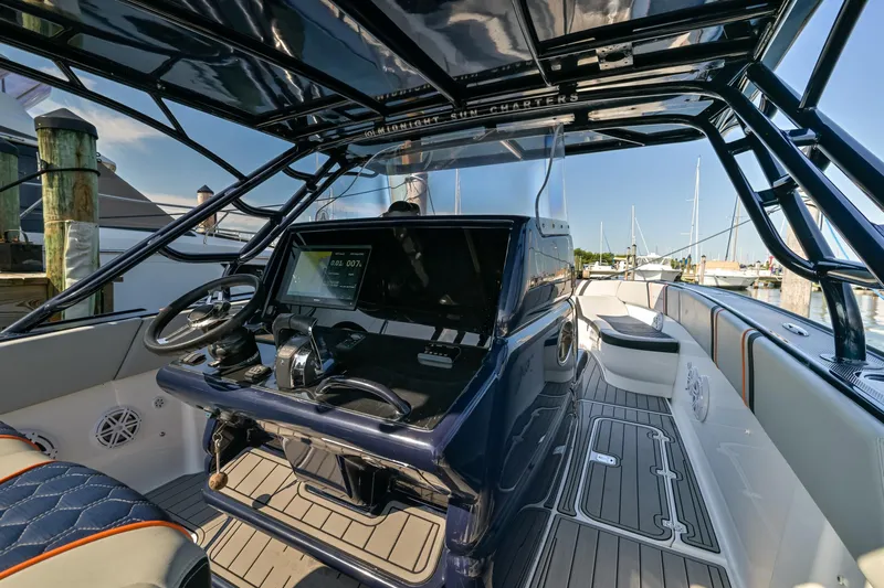 Opal Yacht Photos Pics 2014 Midnight Express 37’ Open boat interior with sleek design and advanced navigation system.