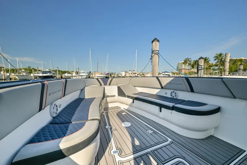 Opal Yacht Photos Pics 2014 Midnight Express 37’ Open boat interior with sleek seating and marina view.