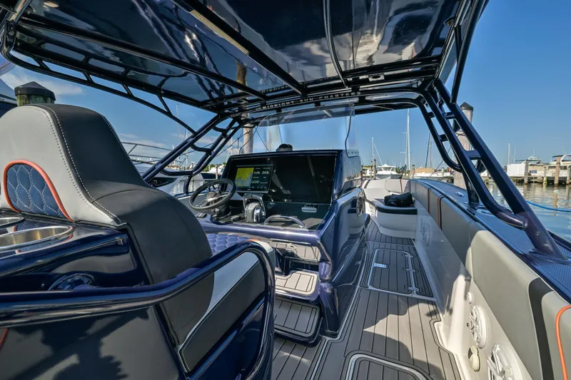 Opal Yacht Photos Pics 2014 Midnight Express 37’ Open boat interior with sleek design and advanced navigation system.