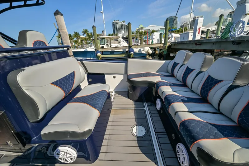 Opal Yacht Photos Pics Luxurious seating on a 2014 Midnight Express 37’ Open boat at a marina.