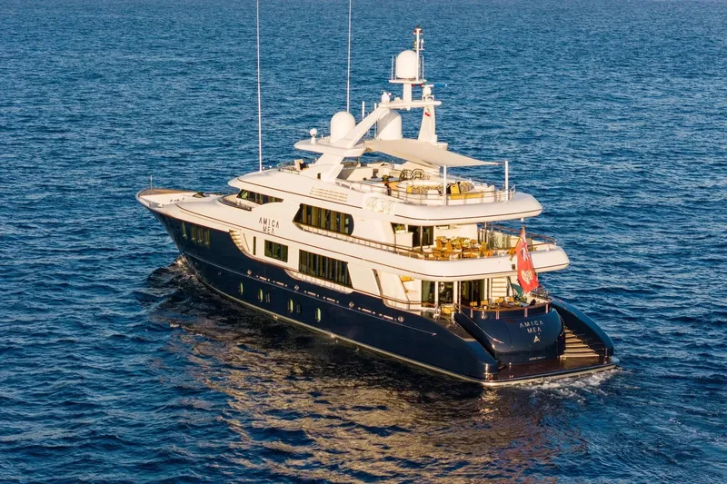 Amica Mea Yacht Photos Pics Luxurious 2004 Hakvoort Custom yacht cruising on open sea, elegant design and spacious decks.