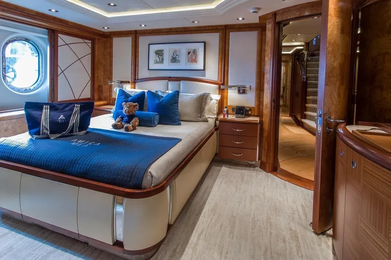 Amica Mea Yacht Photos Pics Luxurious 2004 Hakvoort Custom yacht bedroom with elegant decor and plush bedding.