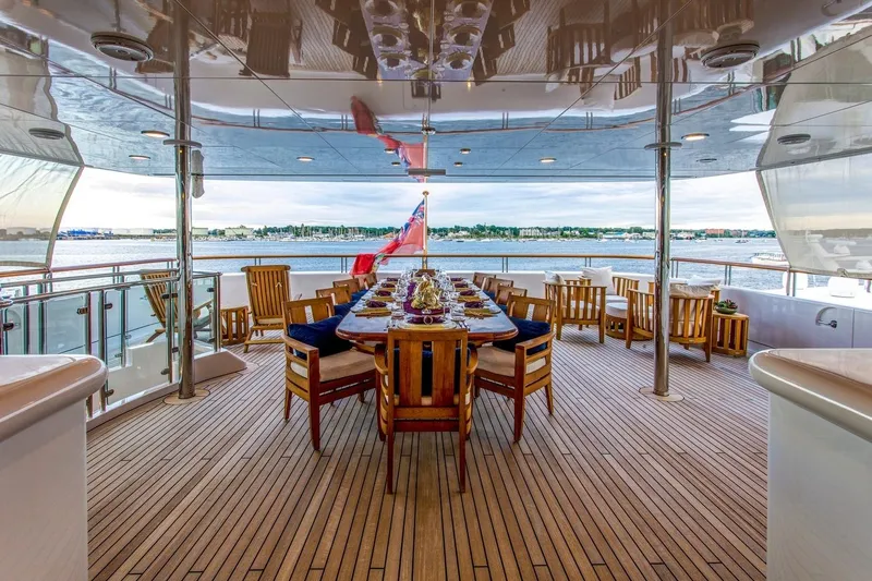 Amica Mea Yacht Photos Pics Luxurious dining area on 2004 Hakvoort Custom yacht with ocean view.