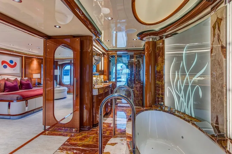 Amica Mea Yacht Photos Pics Luxurious 2004 Hakvoort Custom yacht interior with elegant wood finishes and modern design.