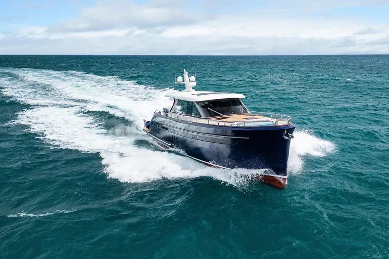 Tribu Yacht Photos Pics Steeler 60 S Performance yacht cruising on open sea, 2021 model.