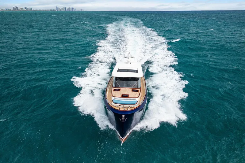 Tribu Yacht Photos Pics Steeler 60 S Performance yacht cruising on open sea, 2021 model.