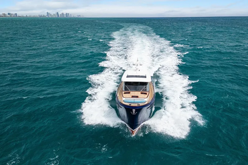 Tribu Yacht Photos Pics Steeler 60 S Performance yacht cruising on open sea, 2021 model.