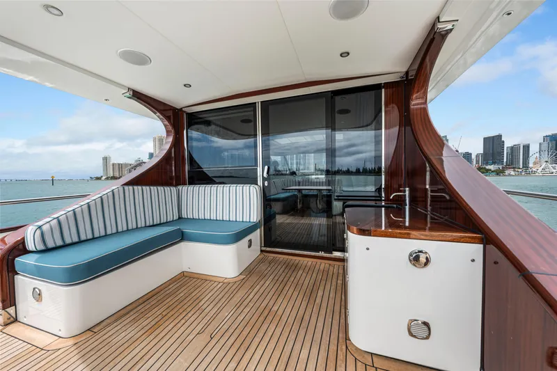 Tribu Yacht Photos Pics Luxurious 2021 Steeler 60 S Performance yacht deck with city skyline view.