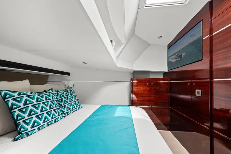 Tribu Yacht Photos Pics Luxurious cabin interior of 2021 Steeler 60 S Performance yacht with modern decor.