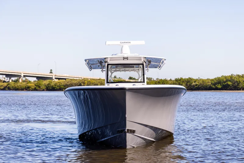  Yacht Photos Pics 2024 Yellowfin 39 Offshore boat on calm water, front view.