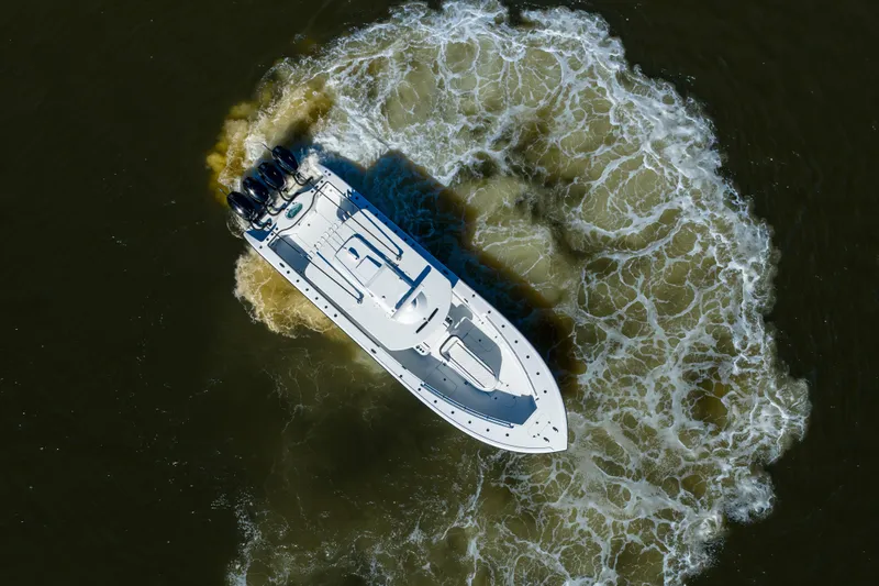  Yacht Photos Pics Aerial view of 2024 Yellowfin 39 Offshore boat making a circular wake.