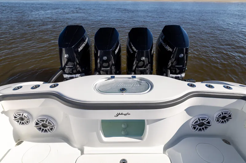  Yacht Photos Pics 2024 Yellowfin 39 Offshore boat with four powerful Mercury Verado engines on open water.