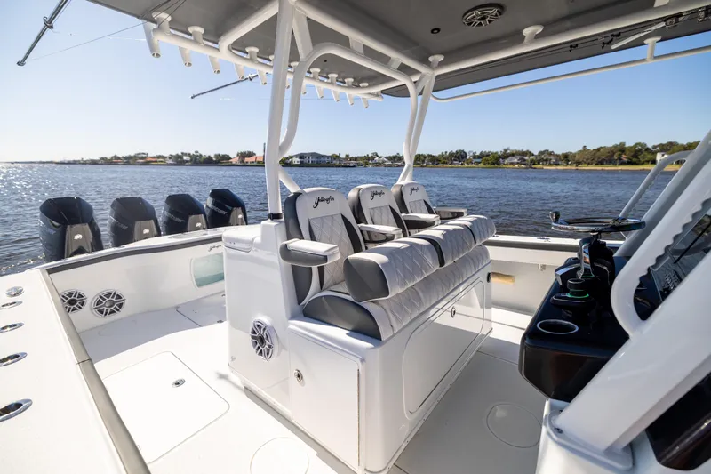  Yacht Photos Pics 2024 Yellowfin 39 Offshore boat interior with seating and multiple outboard engines.