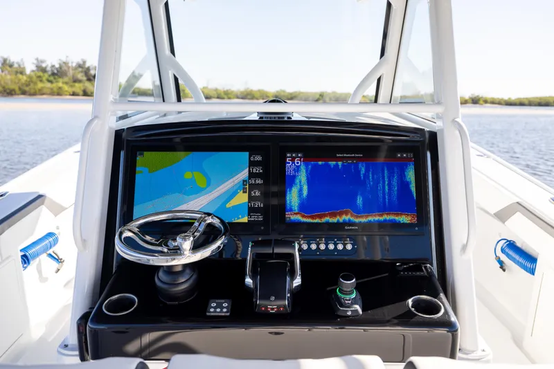  Yacht Photos Pics 2024 Yellowfin 39 Offshore boat dashboard with advanced navigation displays.