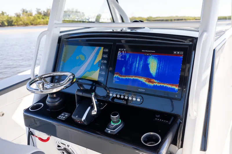  Yacht Photos Pics 2024 Yellowfin 39 Offshore boat dashboard with advanced navigation and sonar displays.