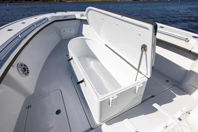 Yacht Photos Pics 2024 Yellowfin 39 Offshore boat with open storage compartment on deck.
