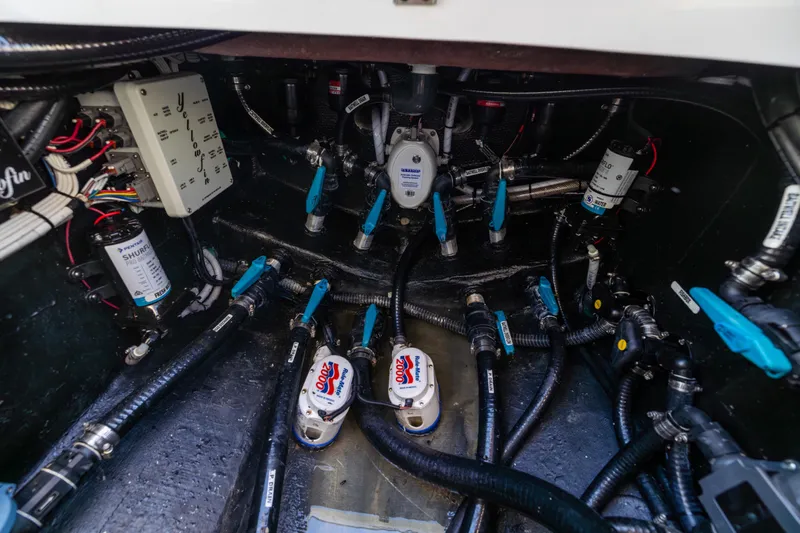  Yacht Photos Pics 2024 Yellowfin 39 Offshore boat engine compartment with wiring and plumbing systems.