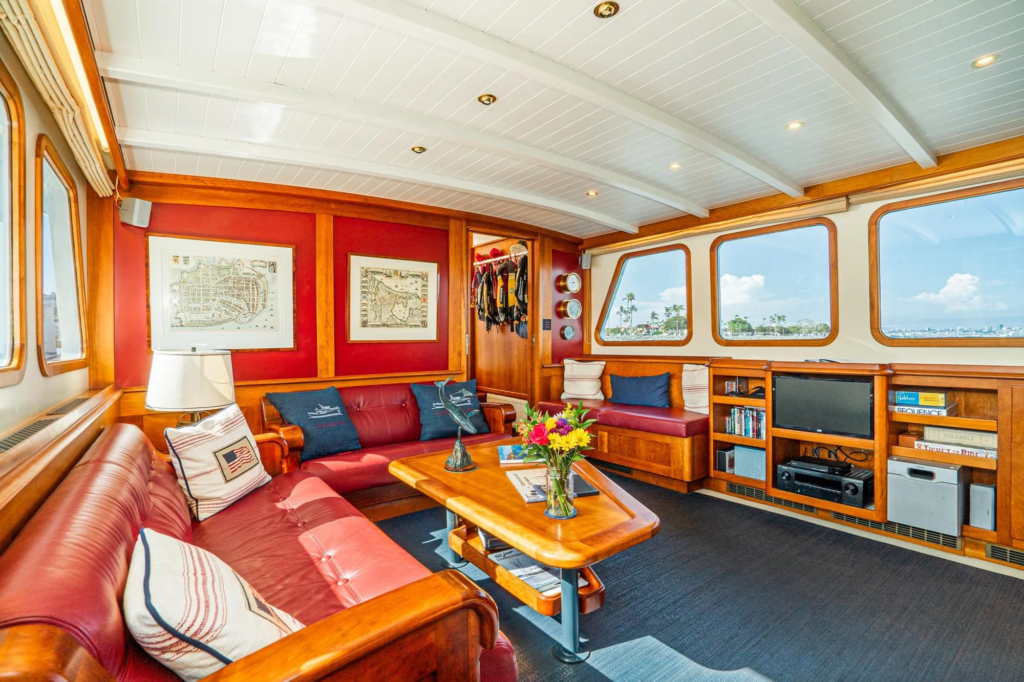 Luxurious 1965 Van der Molen Custom yacht interior with elegant wood finishes and comfortable seating.